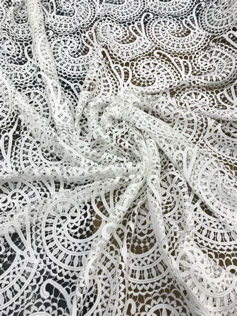 guipure lace on mesh fabric